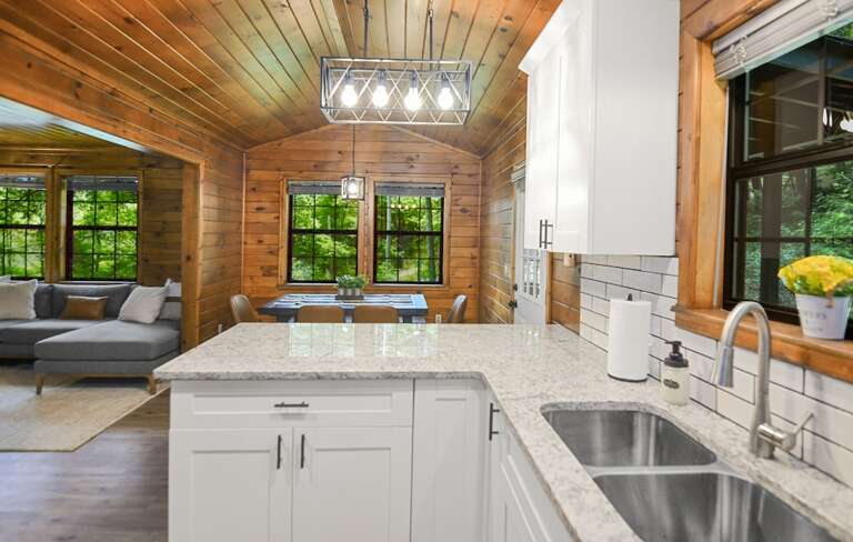 Kitchen w/ granite tops and SS appliances  Kitchen w/ granite tops and SS appliances