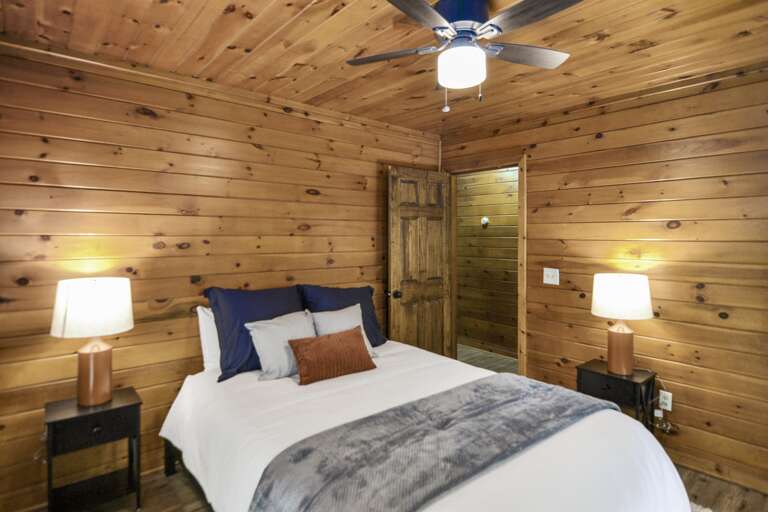 Bedroom on main level- queen bed  Bedroom on main level- queen bed