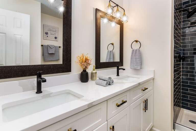 Double vanities w/ new granite tops 