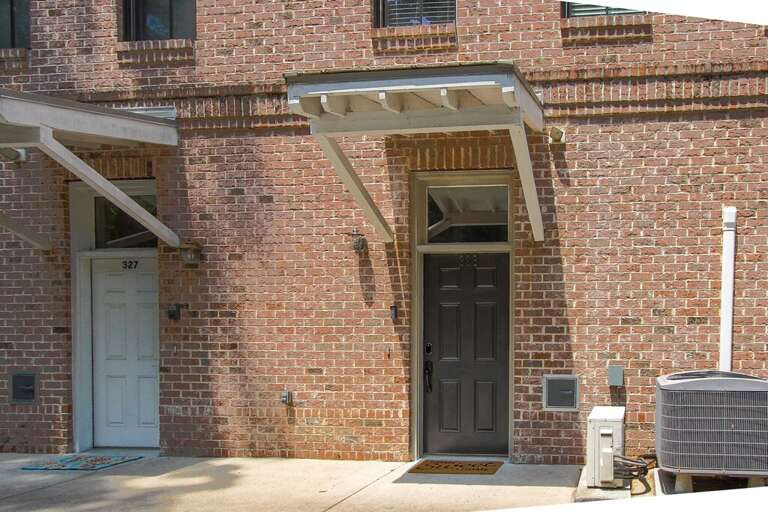 Entry way to the townhome on the back side of Corks Wine Bar
