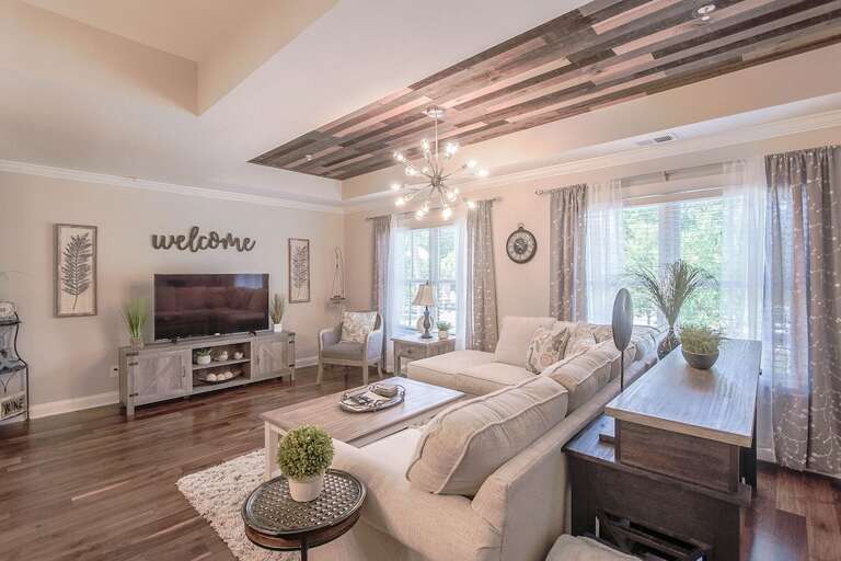 Living room with custom barn wood ceilings