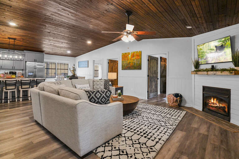 Living Area 1 with New Comfy Couches and Fire Place