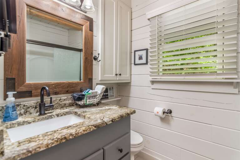 Even the views here are wonderful, as you have access to a full bath with a stand-up shower and a wonderful magnifying mirror.