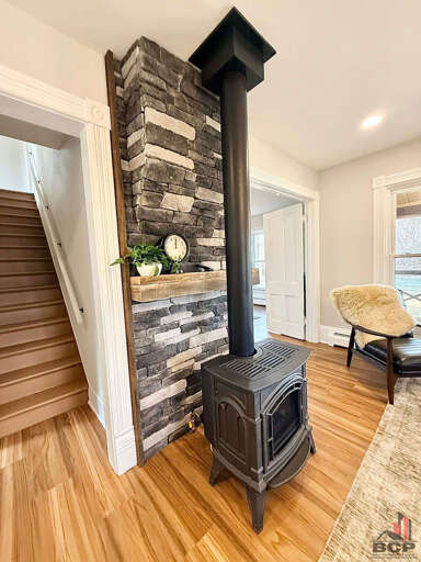 Cozy up to this wood burning fireplace 
