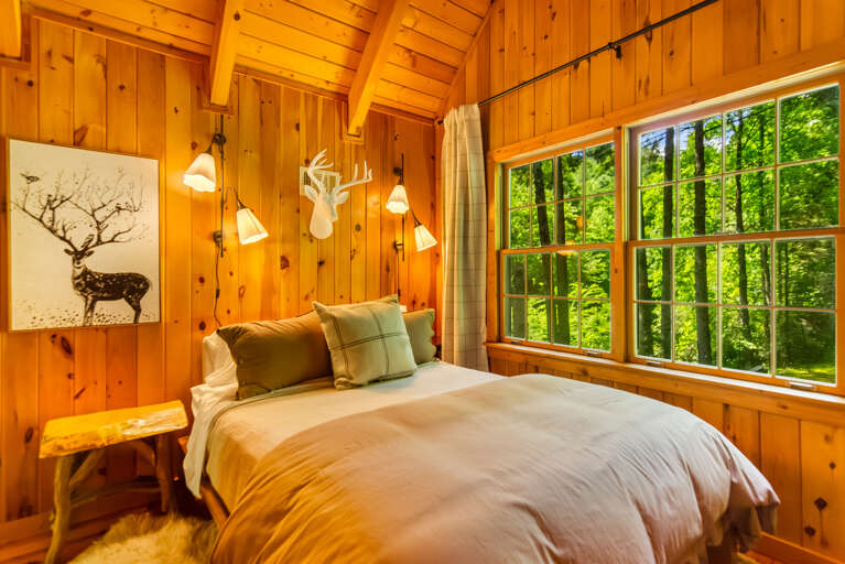 Secondary bedroom overlooking the fire pit area 