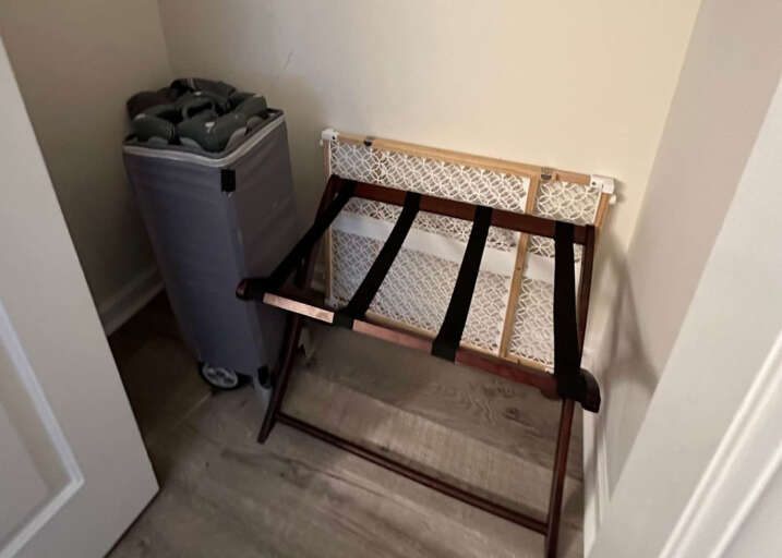 Playpen, baby gate, and luggage rack
