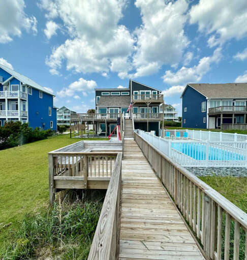Oceanfront view of pool and lawn Oceanfront view of pool and lawn