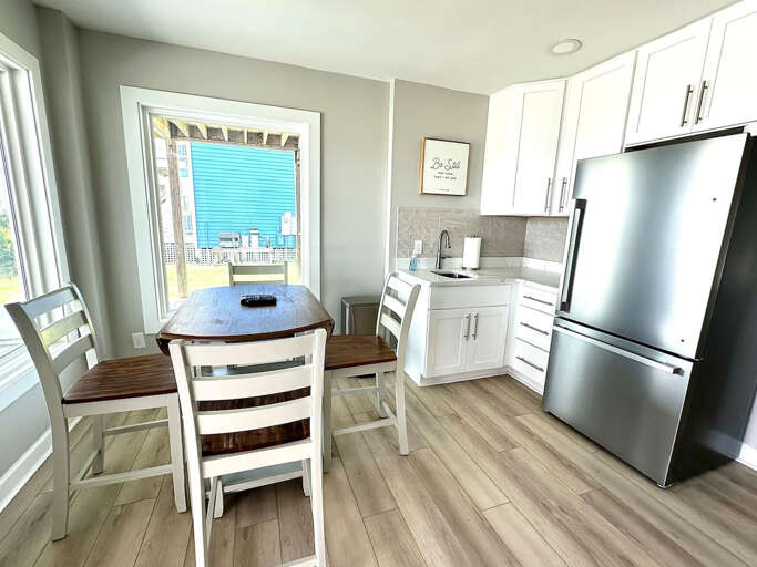 Ground level wet bar and refrigerator