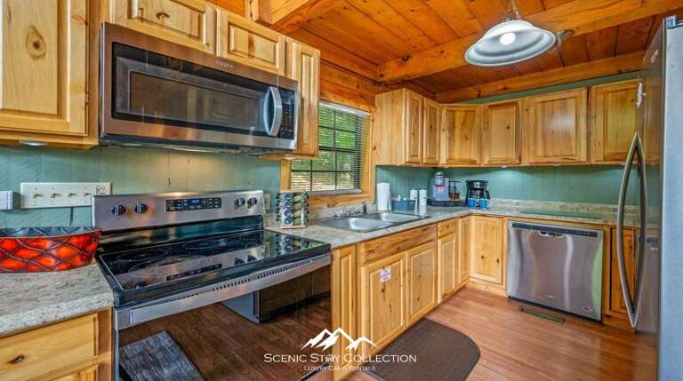 Vacation Rental Kitchen With Wooden Cabinets And Sleek Surfaces