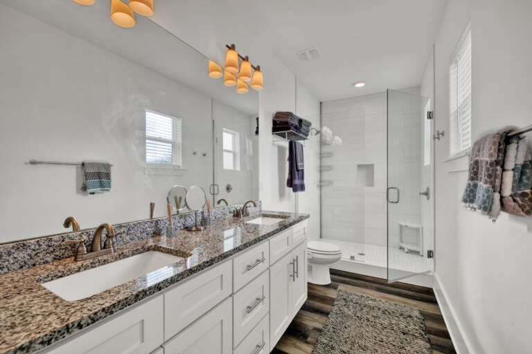 2nd floor King Suite Bathroom with double vanity and large walk in shower