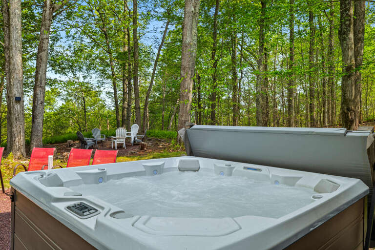 Bubbling Hot Tub Beside Vibrant Forest Foliage