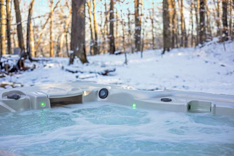 Steamy Spa Surrounded By Snowy Woods