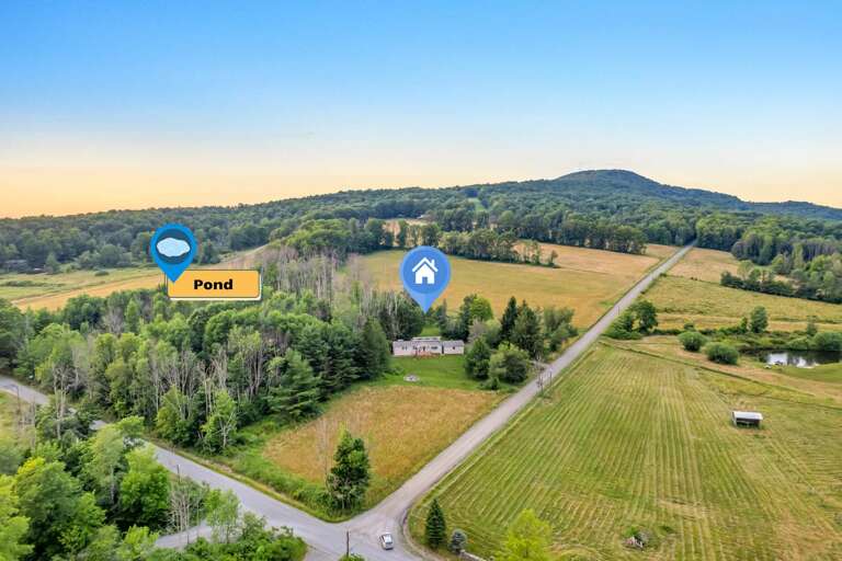 Countryside Landscape With Winding Roads And Sprawling Fields