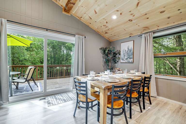 Dining Table With Chairs, Sliding Doors, Deck View