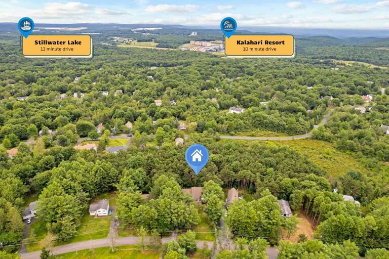 Lush Landscape With Labeled Landmarks And Vacation Rental Pin