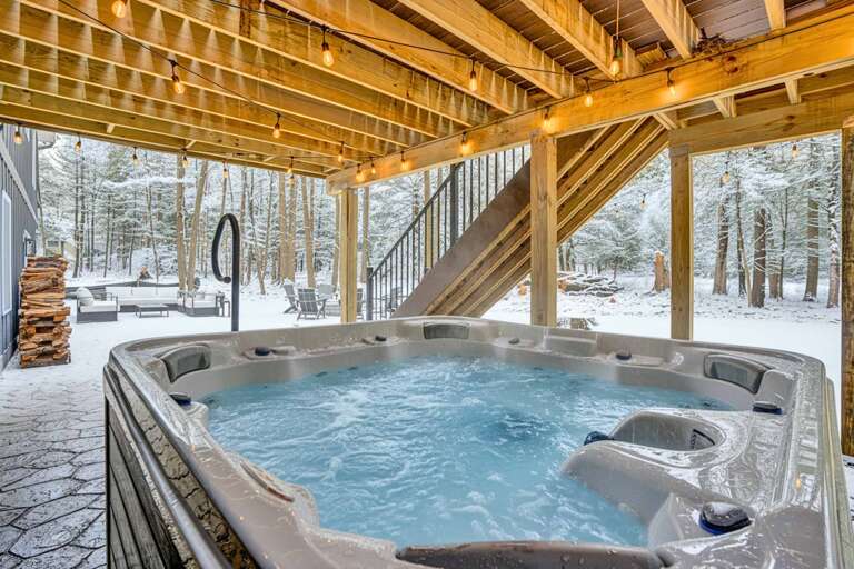 Outdoor Jacuzzi Under Wooden Structure, Snowy Scene, Serene Setting