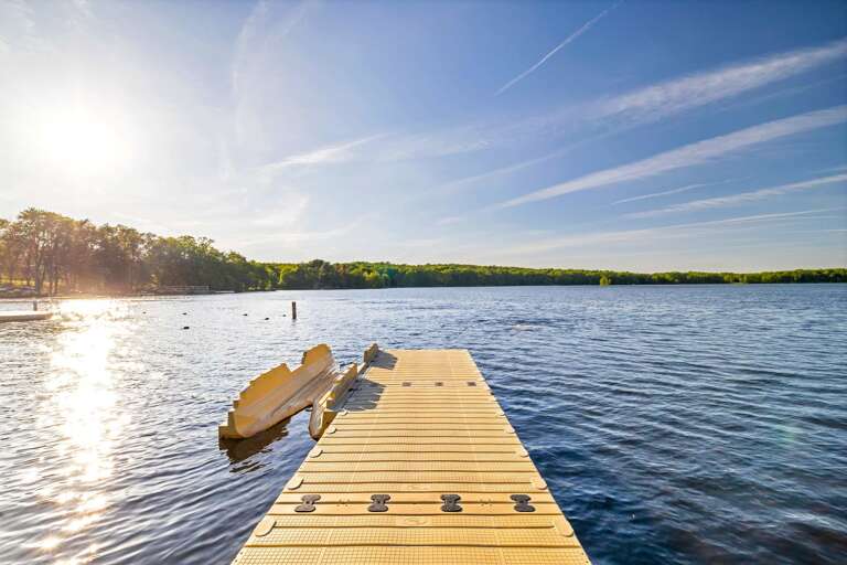 Dock, Canoe, Sunlit Lake, Serene Sky