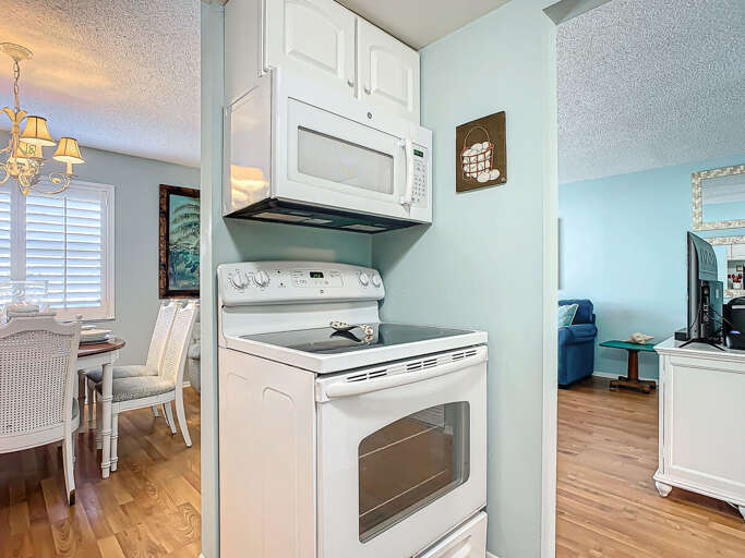 Enjoy a well-organized kitchen with easy access to essential appliances and ample storage.