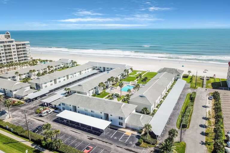 This oceanfront resort features a large pool, well-maintained grounds, and direct beach access. The