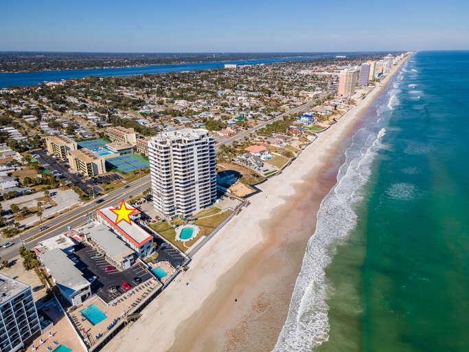 Stay in the heart of the coast with direct beachfront access and stunning Atlantic views. This prime