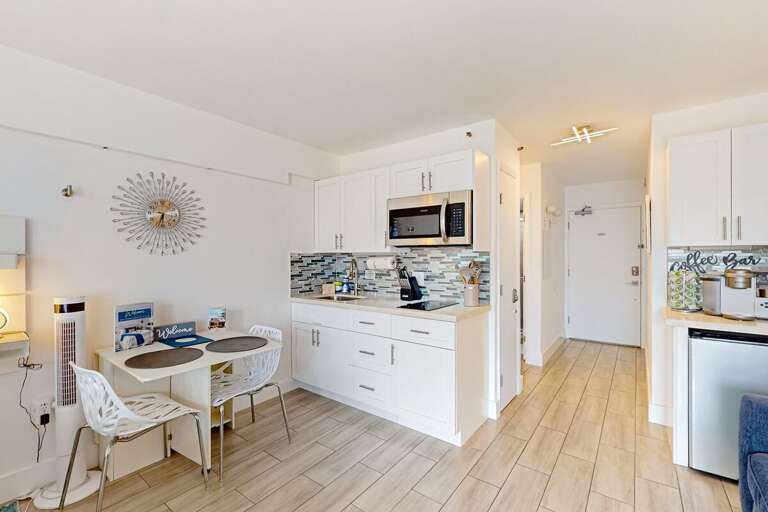 White-walled Residence With Dining Nook And Decorative Details