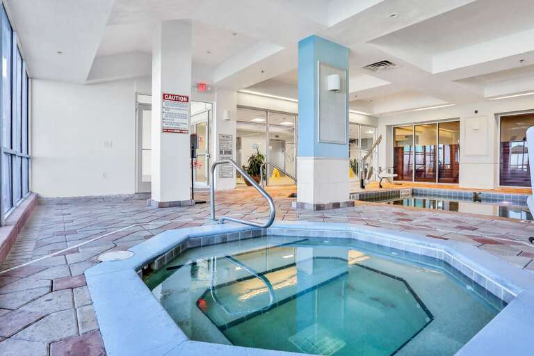Indoor Pool And Hot Tub In Spacious Setting