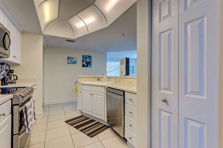 Bright, Breezy Kitchen Space With Sleek Surfaces In A Vacation Rental