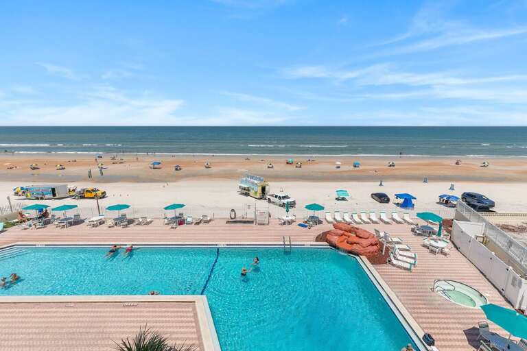 Soak up the best of your beach stay with a sparkling oceanfront pool, relaxing hot tub, and direct
