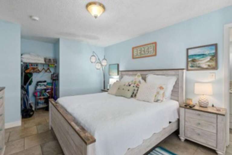 Blue Bedroom With Beach Decor, White Bedspread