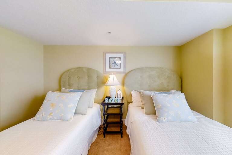 Twin Beds In A Simple, Serene Room