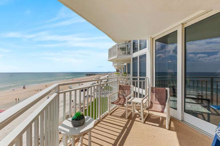 Take in panoramic ocean and coastline views from your private beachfront balcony. Relax with