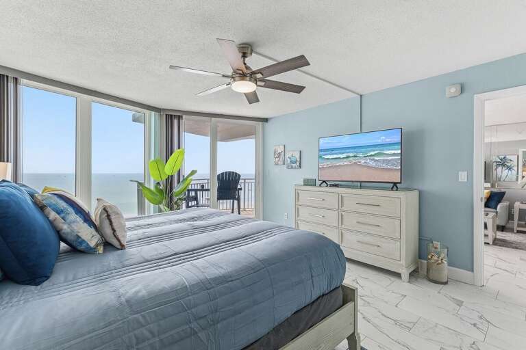 Relax in this spacious oceanfront king suite featuring a Smart TV, private balcony access, and stunning beach views. Wake up to the sound of the waves and enjoy the ultimate beachfront getaway.