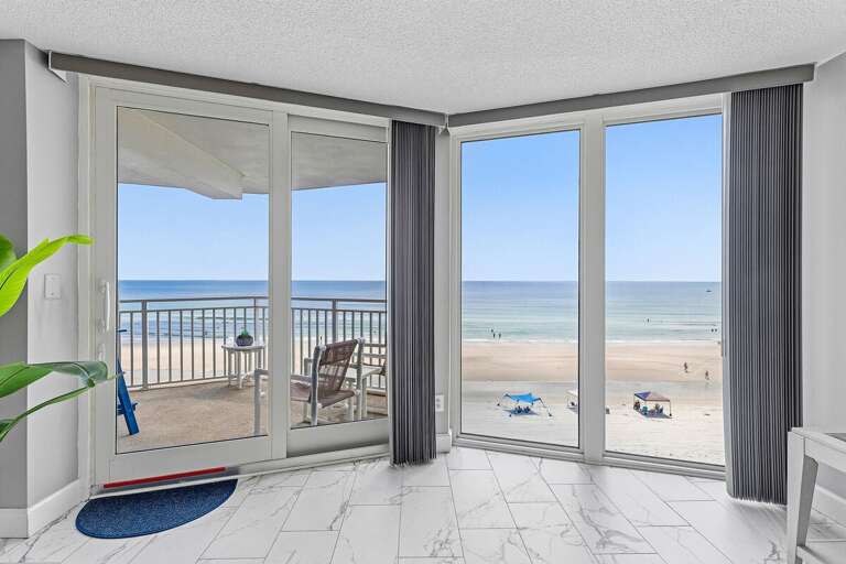 Step onto your private oceanfront balcony and enjoy panoramic beach views, soft sea breezes, and