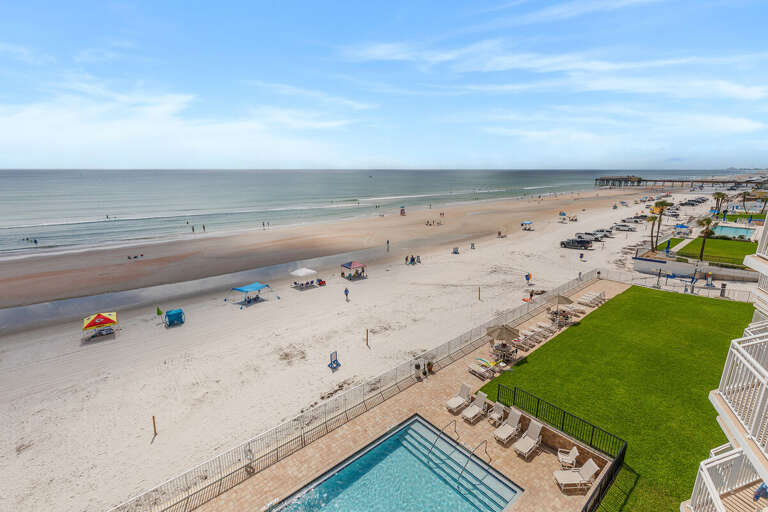 Take in sweeping oceanfront views overlooking the resort pool, direct beach access, and miles of