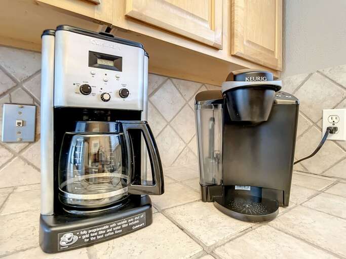 Convenient coffee setup featuring a traditional drip machine and a Keurig, ensuring your perfect morning brew.
