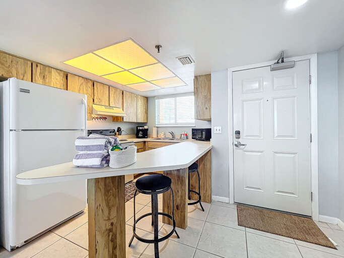 Enjoy the convenience of a fully equipped kitchen, perfect for preparing meals and relaxing with loved ones in a warm and inviting space.