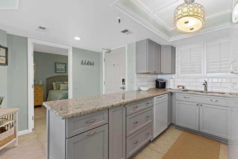 Enjoy a spacious kitchen with ample storage, stylish finishes, and everything you need to prepare meals.