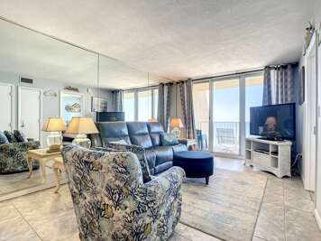 Comfortable seating, ocean views, and mirrored walls create a bright, open atmosphere.