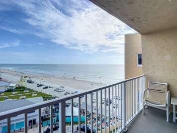 Relax and soak up the panoramic beach views from this private balcony.