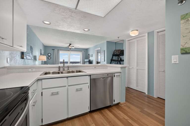 Prepare your favorite meals in this bright, open kitchen featuring ample counter space and a