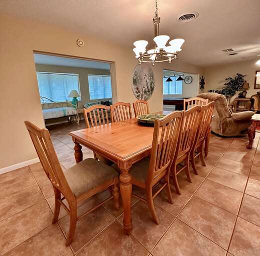 Gather around this spacious dining table with seating for eight — perfect for family meals, game nights, or holiday dinners.