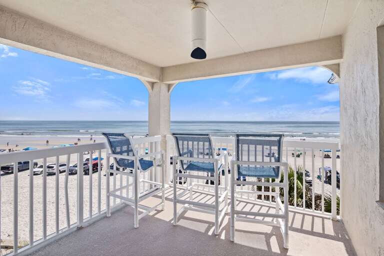 Soak in breathtaking ocean views from this private balcony, perfect for morning coffee or evening sunsets during your beach stay. Just steps from the sand and surf for the ultimate coastal escape.