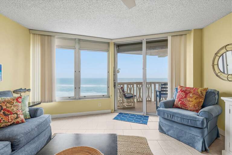Seaside View With Chairs, Cushions, And Circular Mirror