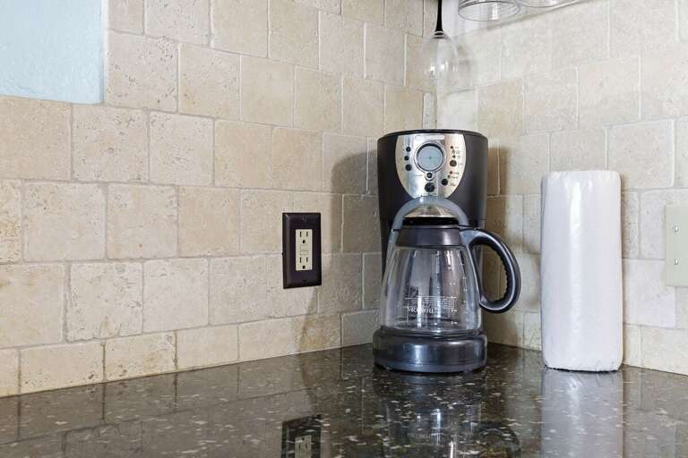Start your beach stay with fresh coffee from the in-suite coffee maker. A convenient touch in this cozy coastal retreat—perfect for easy mornings before heading out for a relaxing day at the beach.