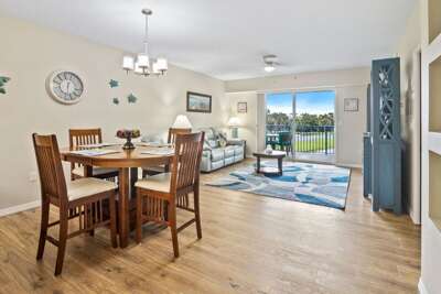 Enjoy a relaxing beach stay in this bright coastal condo featuring an open living and dining area,