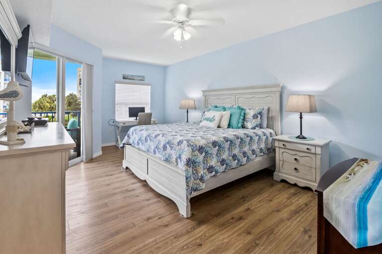 Enjoy a relaxing beach stay in this spacious coastal suite featuring plush bedding, calming décor,