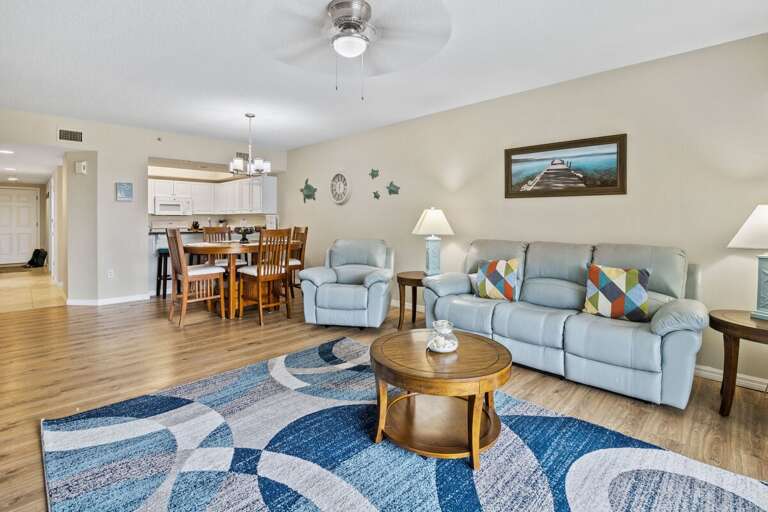 Unwind during your beach stay in this spacious open-concept living and dining area featuring
