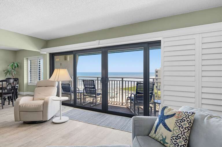 Take in breathtaking oceanfront views from the comfort of this bright coastal condo with private