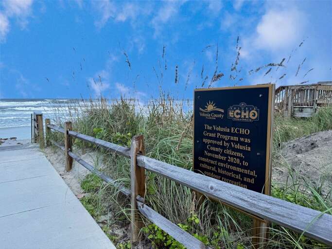 Enjoy direct beach access from your beach stay via this scenic boardwalk overlooking the dunes and Atlantic waves. Experience the beauty of coastal living just steps from your vacation rental.