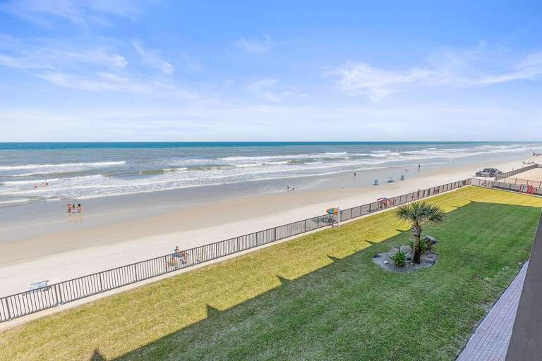 Soak in expansive oceanfront views during your beach stay, with direct beach access just steps away. Enjoy sun, sand, and surf while relaxing in a prime coastal location ideal for your getaway.